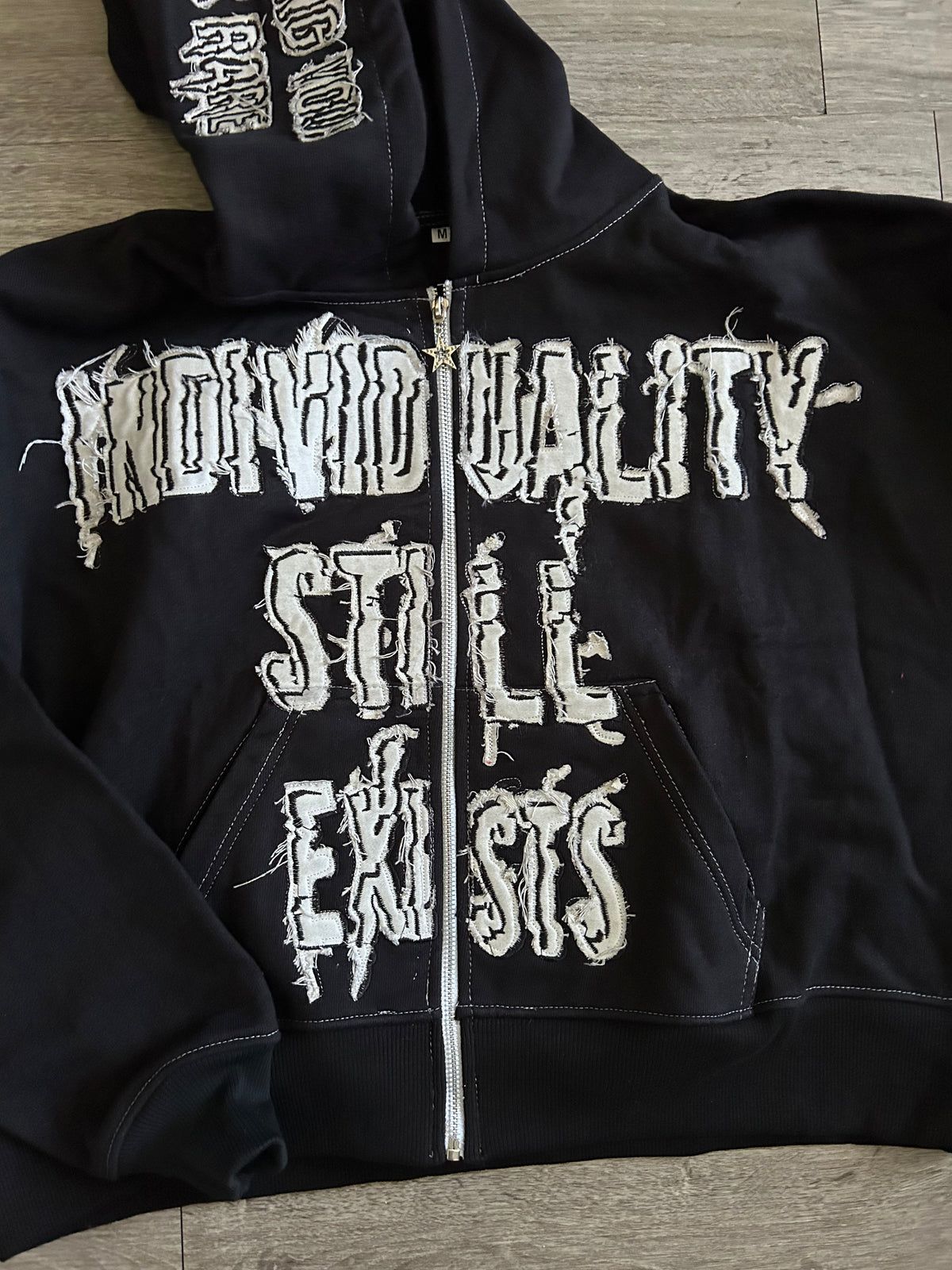 “Individuality Still Exists” Zip-Up